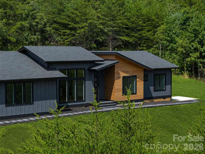 7 Spicebush Lane, Weaverville, NC 28787.  MLS# CAR4414124, YatesRealty ID 44164. Virtually enhanced grass