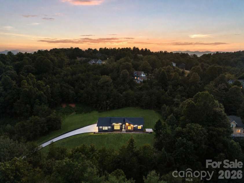 7 Spicebush Lane, Weaverville, NC 28787.  MLS# CAR4414124, YatesRealty ID 44164. Virtually enhanced grass