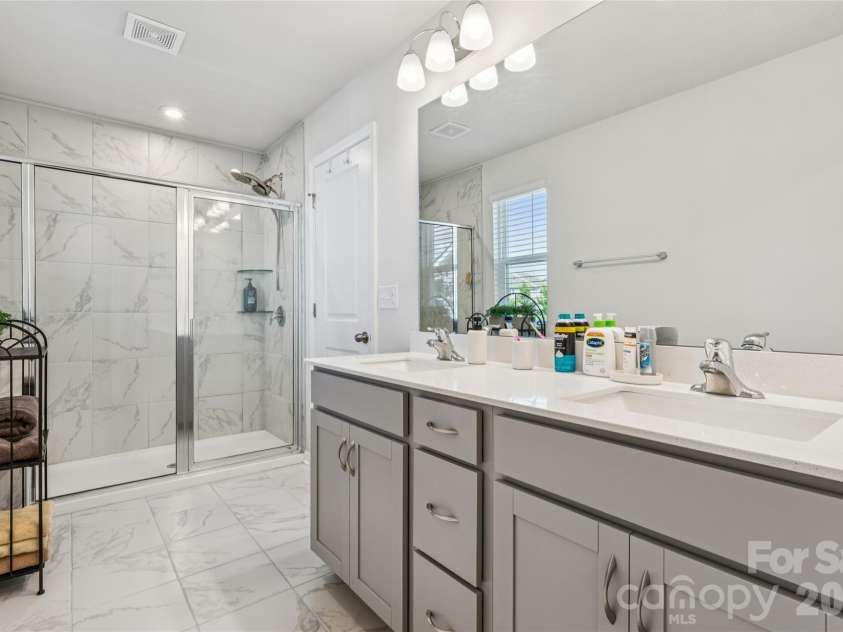 5119 Carrick Street, Charlotte, NC 28213.  MLS# CAR4413712, YatesRealty ID 44165. Primary bathroom
