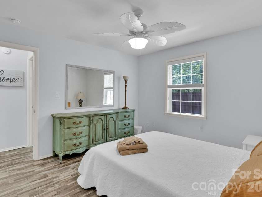 4701 Yacht Drive, Oak Island, NC 28465.  MLS# CAR4413735, YatesRealty ID 44167. Large Master Suite Facing Woods and Private BackYard!