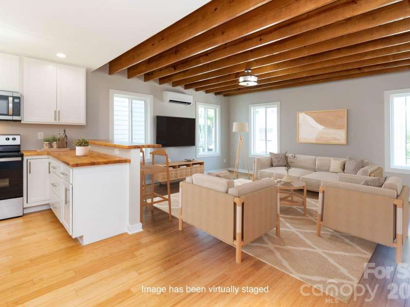 56 Cascade Street, Asheville, NC 28704.  MLS# CAR4413479, YatesRealty ID 44173. Living Room/Dining Area - Virtually Staged