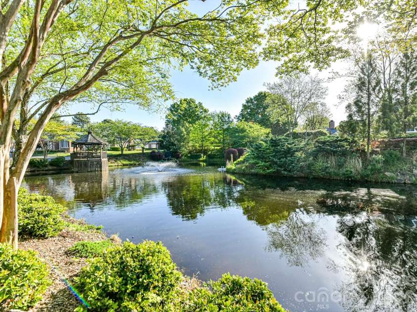 8316 Olde Troon Drive, Charlotte, NC 28277.  MLS# CAR4413453, YatesRealty ID 44176. Community Pond