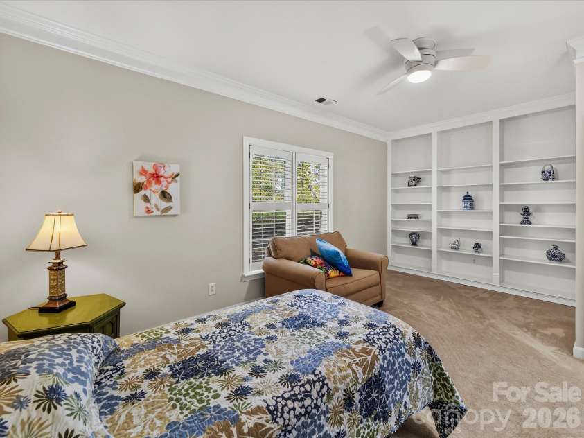 8316 Olde Troon Drive, Charlotte, NC 28277.  MLS# CAR4413453, YatesRealty ID 44176. Guestroom with built-in shelving