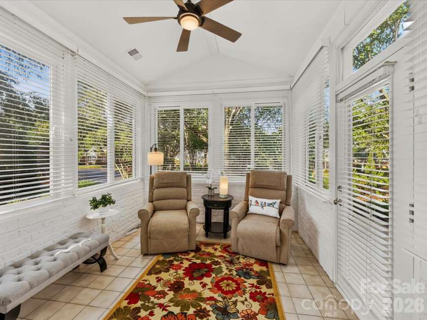 8316 Olde Troon Drive, Charlotte, NC 28277.  MLS# CAR4413453, YatesRealty ID 44176. Lovely sunroom with updated windows