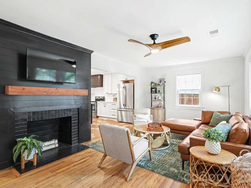 1333 Cortland Road, Charlotte, NC 28209.  MLS# CAR4413455, YatesRealty ID 44177. Accent fireplace with floating mantel