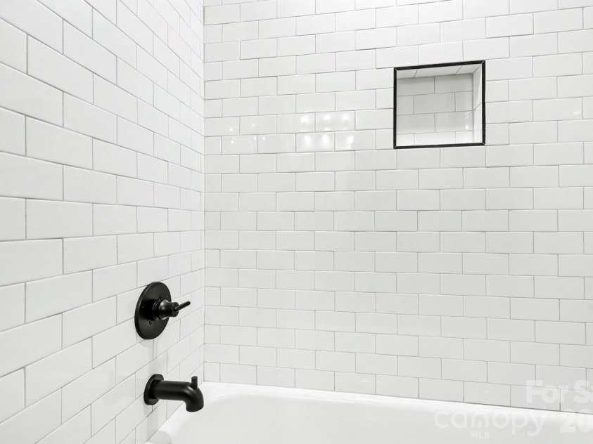 1333 Cortland Road, Charlotte, NC 28209.  MLS# CAR4413455, YatesRealty ID 44177. Floor to ceiling tile