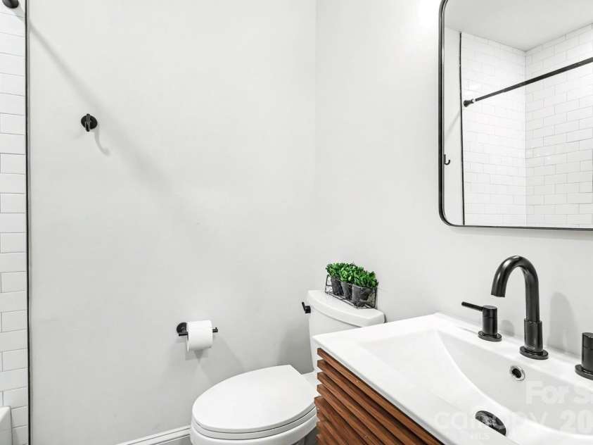 1333 Cortland Road, Charlotte, NC 28209.  MLS# CAR4413455, YatesRealty ID 44177. Hall Bathroom