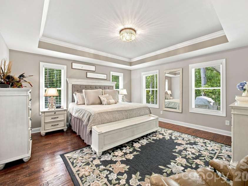 116 Harbor Ridge Drive, Statesville, NC 28677.  MLS# CAR4413143, YatesRealty ID 44187. Serene Primary Bedroom with tray ceiling.