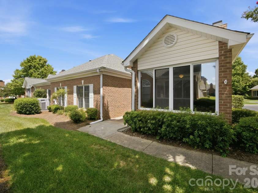 8528 Highland Glen Drive, Charlotte, NC 28269.  MLS# CAR4412611, YatesRealty ID 44205. Entry and Sunroom