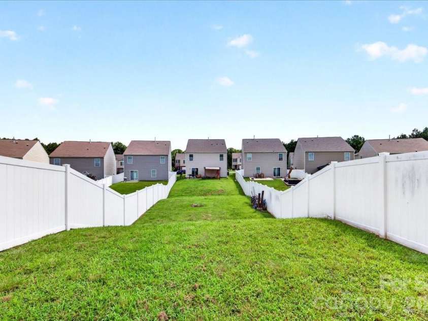 4033 Long Arrow Drive, Concord, NC 28025.  MLS# CAR4412395, YatesRealty ID 44208. Backyard