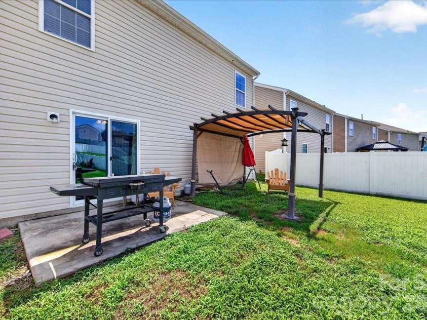 4033 Long Arrow Drive, Concord, NC 28025.  MLS# CAR4412395, YatesRealty ID 44208. Backyard