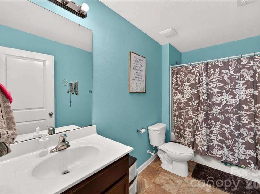 4033 Long Arrow Drive, Concord, NC 28025.  MLS# CAR4412395, YatesRealty ID 44208. Guest bath