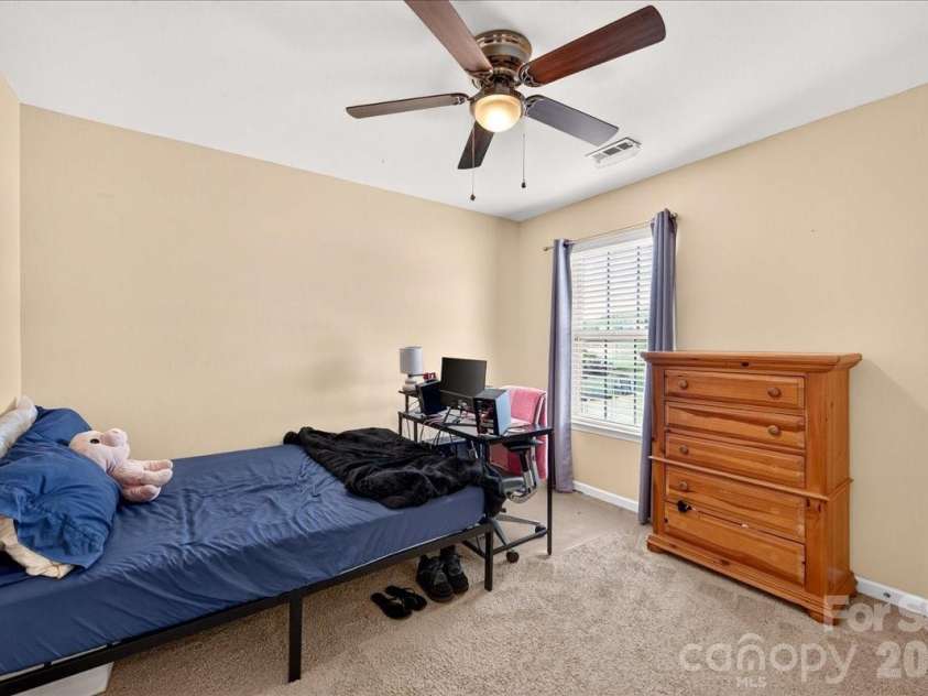 4033 Long Arrow Drive, Concord, NC 28025.  MLS# CAR4412395, YatesRealty ID 44208. Guest bedroom
