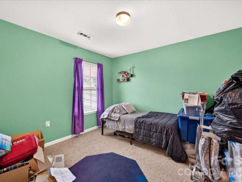 4033 Long Arrow Drive, Concord, NC 28025.  MLS# CAR4412395, YatesRealty ID 44208. Guest bedroom