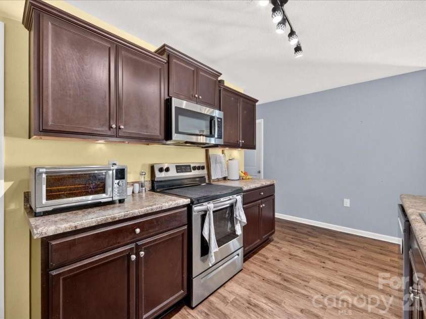 4033 Long Arrow Drive, Concord, NC 28025.  MLS# CAR4412395, YatesRealty ID 44208. Kitchen
