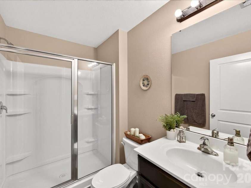 4033 Long Arrow Drive, Concord, NC 28025.  MLS# CAR4412395, YatesRealty ID 44208. Main level bathroom