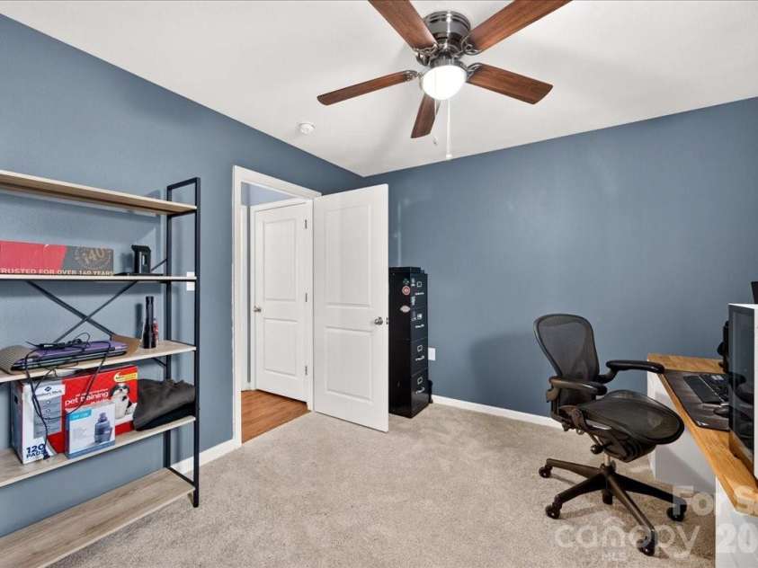 4033 Long Arrow Drive, Concord, NC 28025.  MLS# CAR4412395, YatesRealty ID 44208. Main level guest bedroom