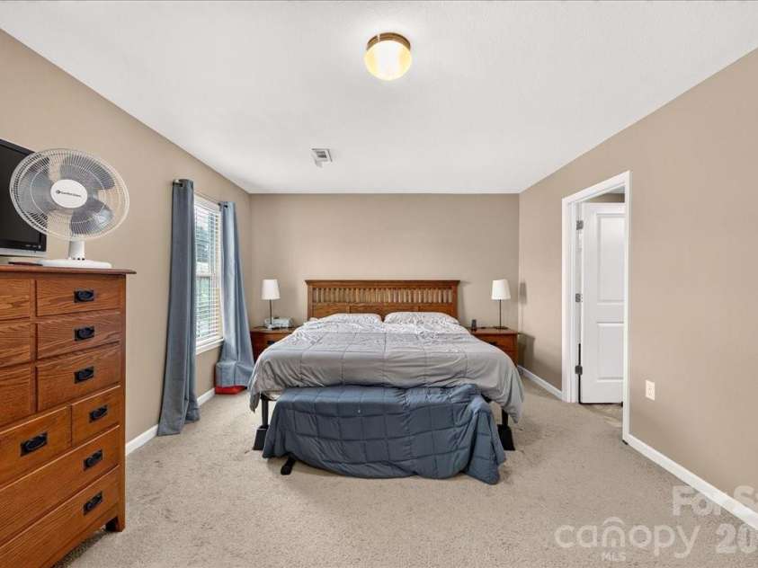 4033 Long Arrow Drive, Concord, NC 28025.  MLS# CAR4412395, YatesRealty ID 44208. Primary bedroom