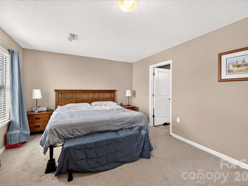 4033 Long Arrow Drive, Concord, NC 28025.  MLS# CAR4412395, YatesRealty ID 44208. Primary bedroom