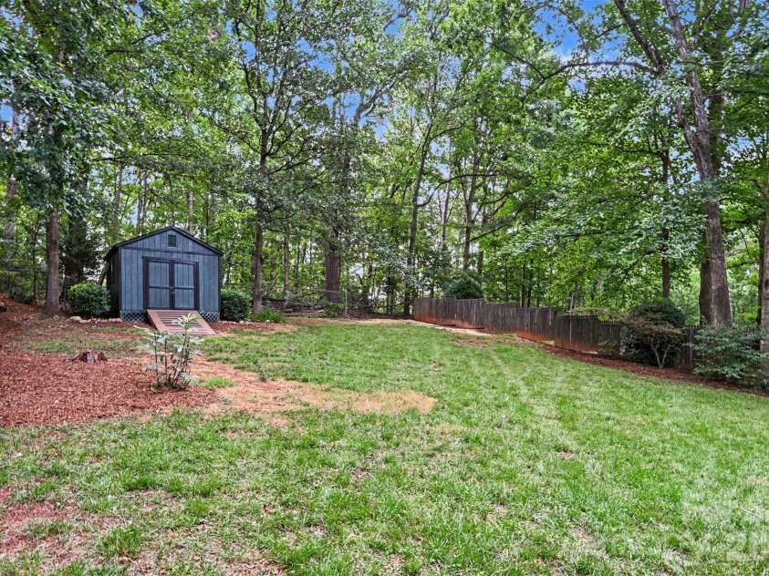 1928 Twin Ponds Drive, Hickory, NC 28602.  MLS# CAR4411717, YatesRealty ID 44222. Fenced Backyard with Storage Shed