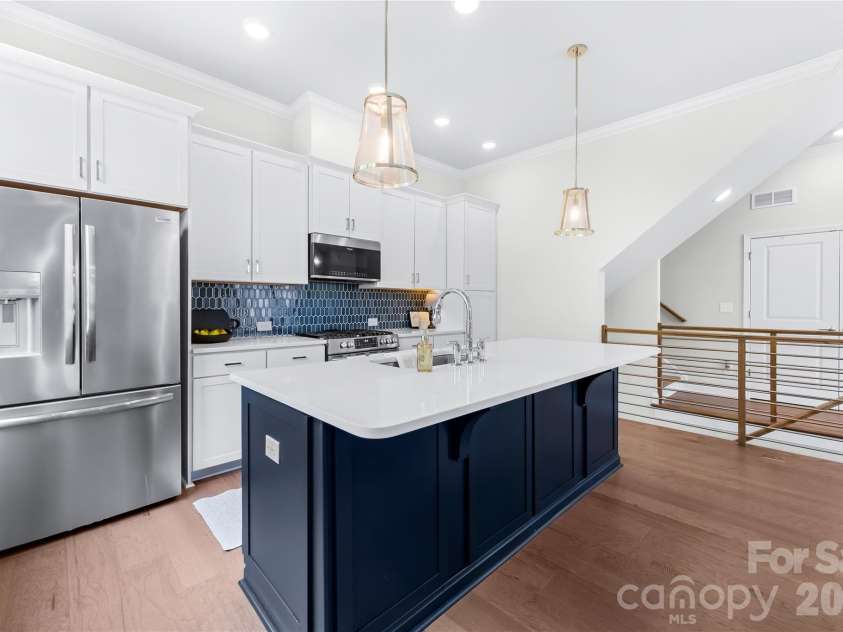 5919 Ardrey Kell Road, Charlotte, NC 28277.  MLS# CAR4411424, YatesRealty ID 44225. Chrome hardware + upgraded lighting over island