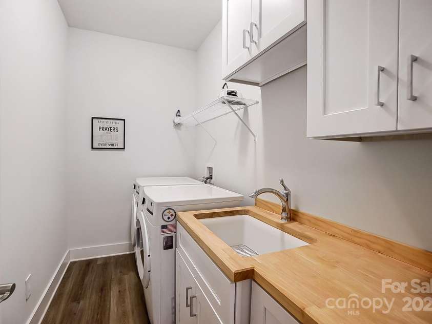 2597 Craig Farm Road, Lancaster, SC 29720.  MLS# CAR4239760, YatesRealty ID 4423. Laundry upper/lower cabinets & sink