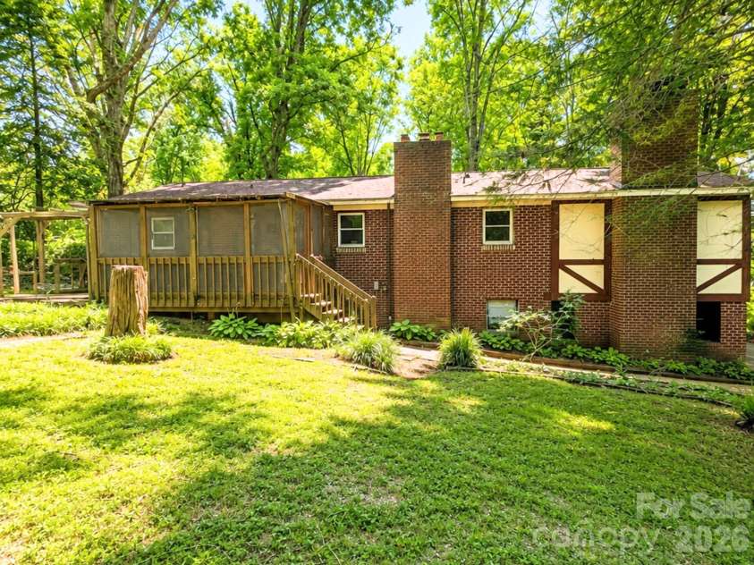 101 Sherry Drive, Stanley, NC 28164.  MLS# CAR4410482, YatesRealty ID 44231. Backyard with enclosed deck area