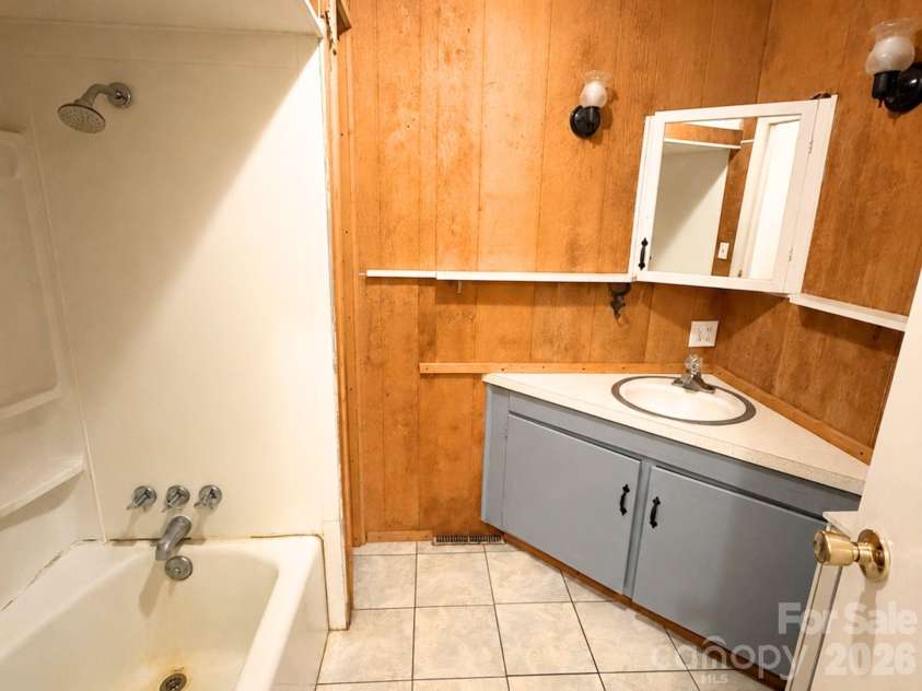 101 Sherry Drive, Stanley, NC 28164.  MLS# CAR4410482, YatesRealty ID 44231. Bathroom 1
