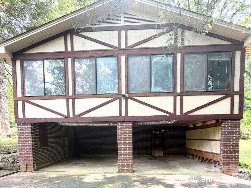 101 Sherry Drive, Stanley, NC 28164.  MLS# CAR4410482, YatesRealty ID 44231. Carport that leads into unfinished basement