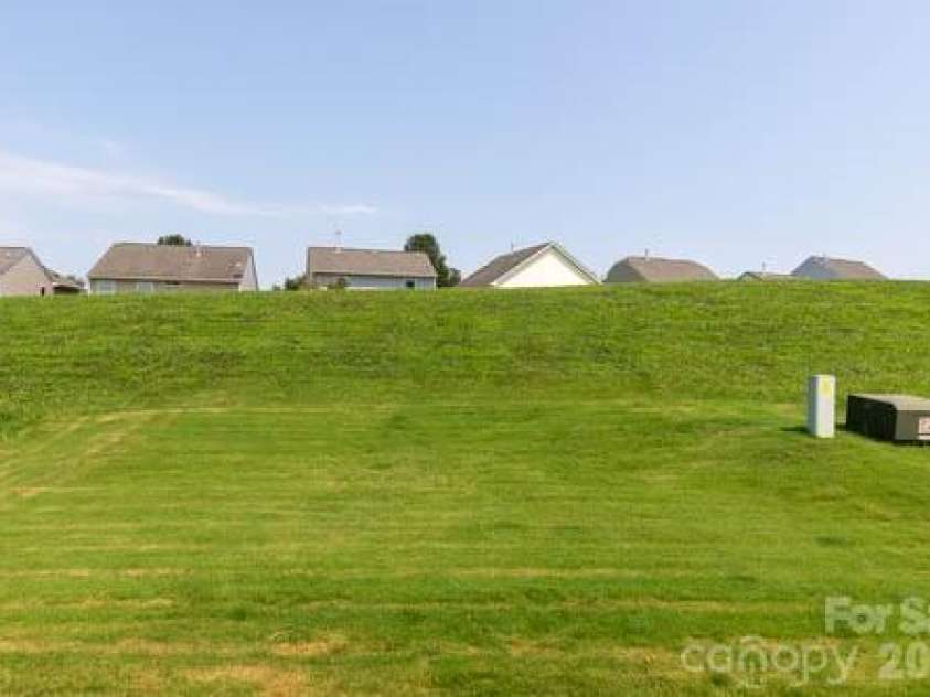 216 Crane Creek Way, Lexington, NC 27295.  MLS# CAR4410803, YatesRealty ID 44232. Burm in Backyard allows privacy