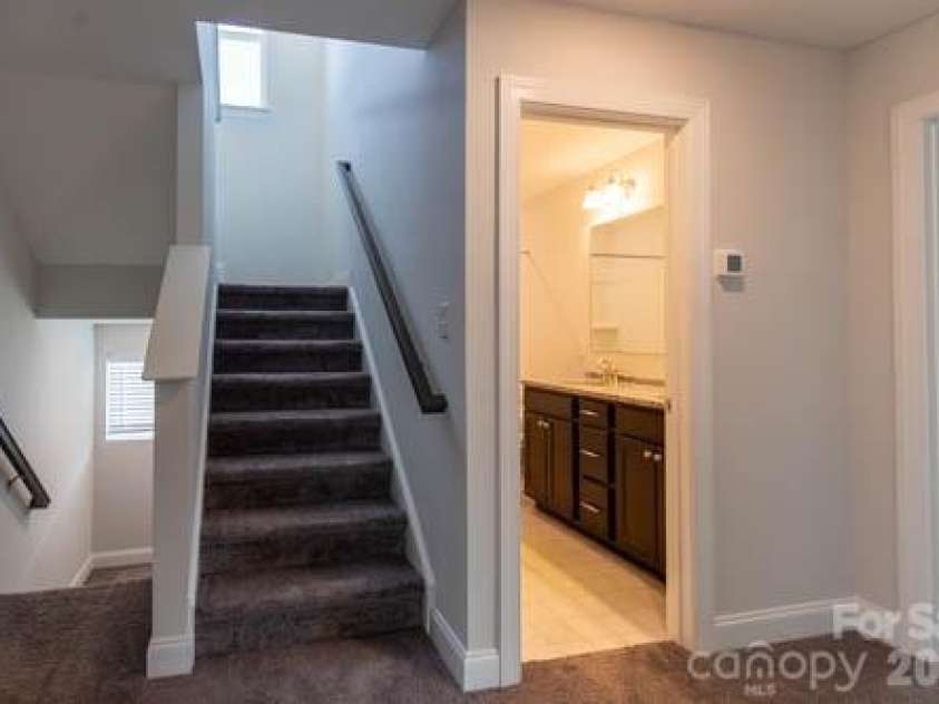 216 Crane Creek Way, Lexington, NC 27295.  MLS# CAR4410803, YatesRealty ID 44232. Stairs to Third Floor
