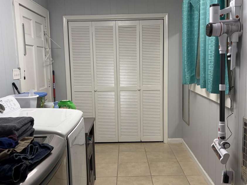 1876 Drexel Road, Valdese, NC 28690.  MLS# CAR4410903, YatesRealty ID 44233. Laundry room with storage closet