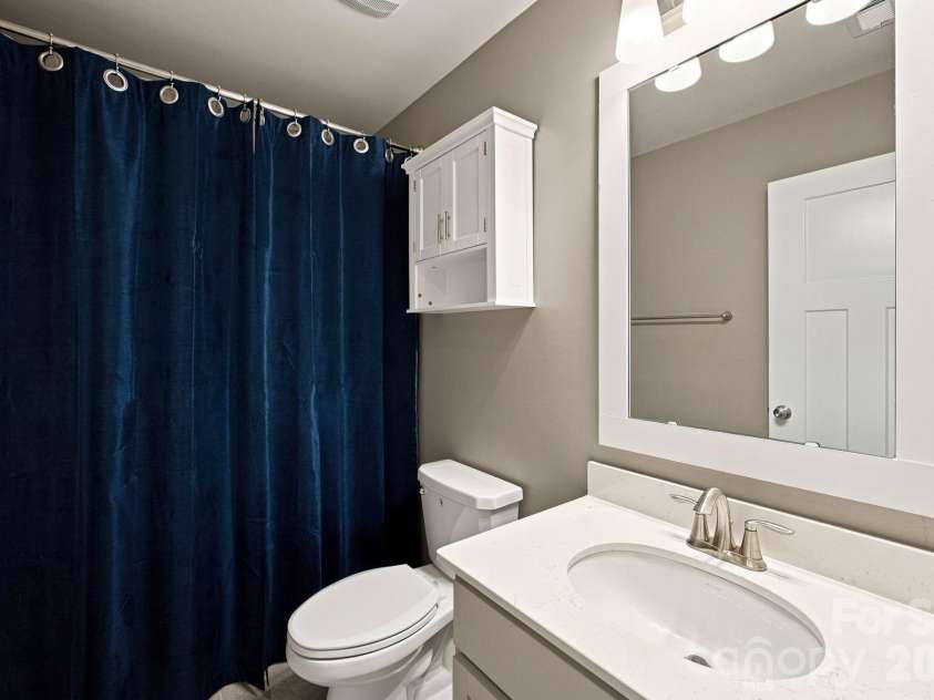1020 Claires Creek Lane, Davidson, NC 28036.  MLS# CAR4410680, YatesRealty ID 44234. Hall full bath