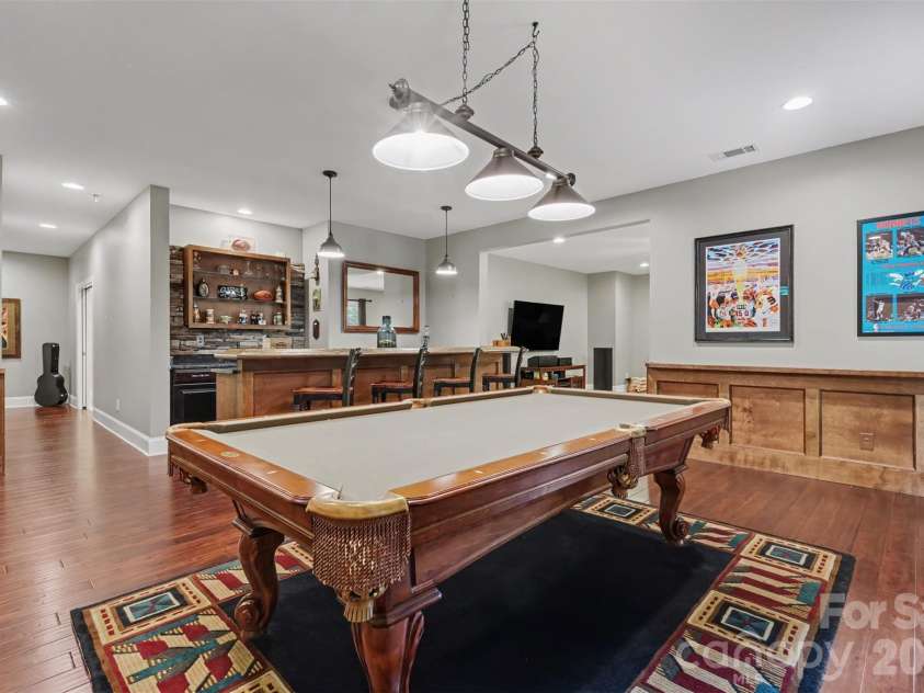4004 Widgeon Way, Waxhaw, NC 28173.  MLS# CAR4409951, YatesRealty ID 44238. Basement Bar/Pool Table