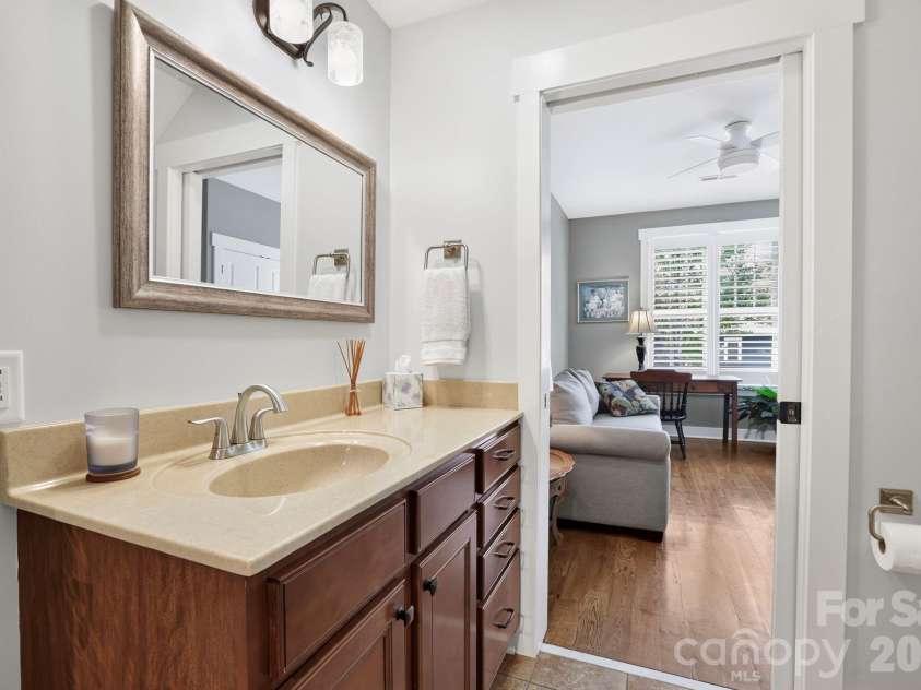 6 Bungalow Way, Asheville, NC 28804.  MLS# CAR4409610, YatesRealty ID 44243. Main level powder room