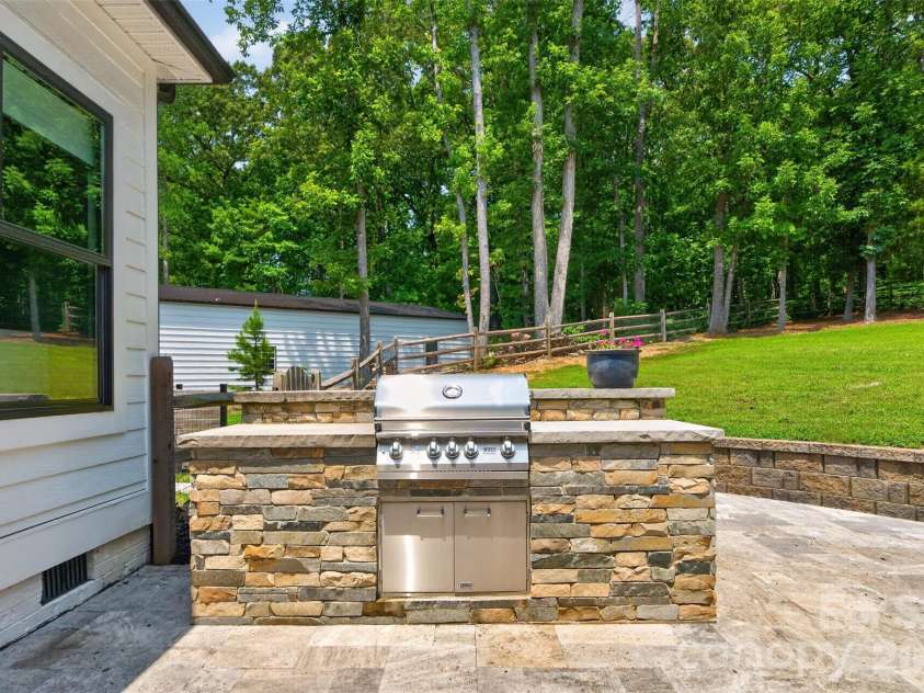 809 Woodland Forest Drive, Waxhaw, NC 28173.  MLS# CAR4409146, YatesRealty ID 44246. It Grillin Time!