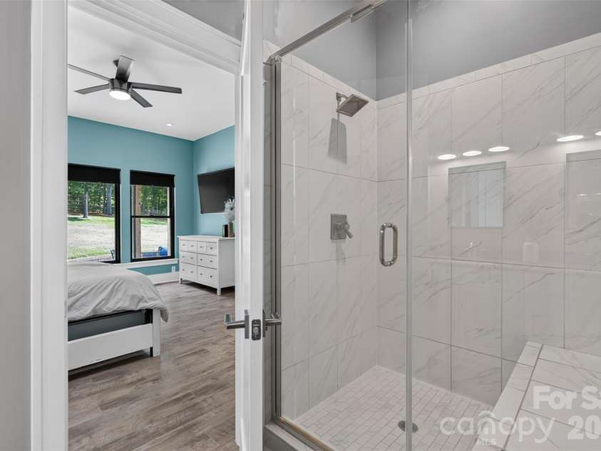 809 Woodland Forest Drive, Waxhaw, NC 28173.  MLS# CAR4409146, YatesRealty ID 44246. Shower with bathing bench
