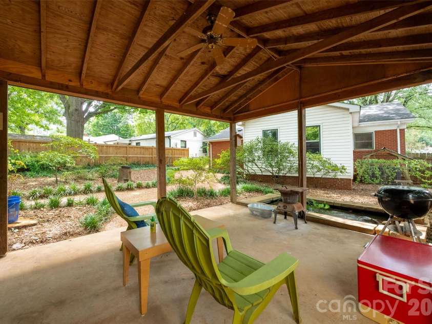 2911 Enfield Road, Charlotte, NC 28205.  MLS# CAR4407774, YatesRealty ID 44249. Workshop overlooking into a fountain