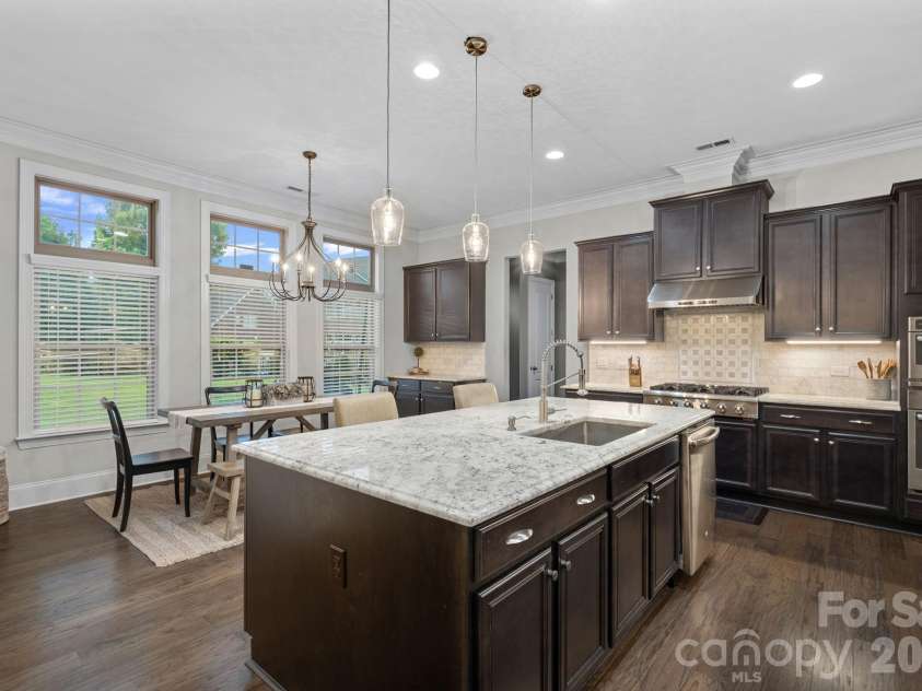 8211 Caesars Head Drive, Waxhaw, NC 28173.  MLS# CAR4408223, YatesRealty ID 44252. Ample cabinets and upgraded sink and faucet