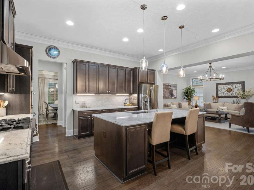8211 Caesars Head Drive, Waxhaw, NC 28173.  MLS# CAR4408223, YatesRealty ID 44252. Chef's kitchen is open to the Great room