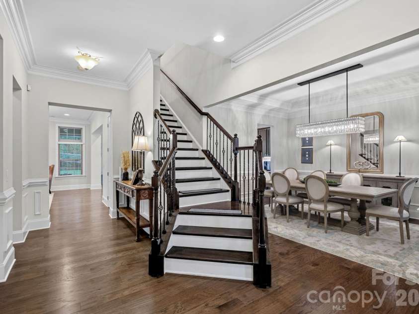 8211 Caesars Head Drive, Waxhaw, NC 28173.  MLS# CAR4408223, YatesRealty ID 44252. Elegant entry with curved staircase
