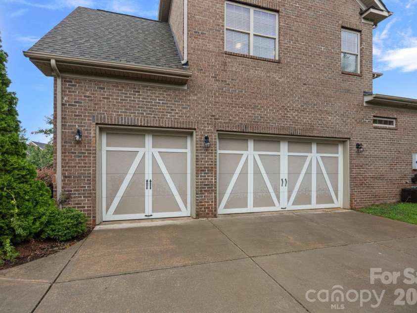 8211 Caesars Head Drive, Waxhaw, NC 28173.  MLS# CAR4408223, YatesRealty ID 44252. Featuring a 3-car side load attached garage!