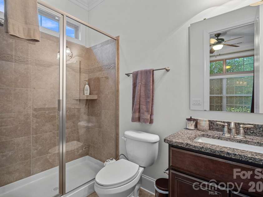8211 Caesars Head Drive, Waxhaw, NC 28173.  MLS# CAR4408223, YatesRealty ID 44252. Guest suite full bath on main level