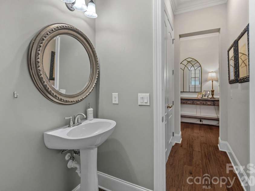 8211 Caesars Head Drive, Waxhaw, NC 28173.  MLS# CAR4408223, YatesRealty ID 44252. Half bath for guests on main