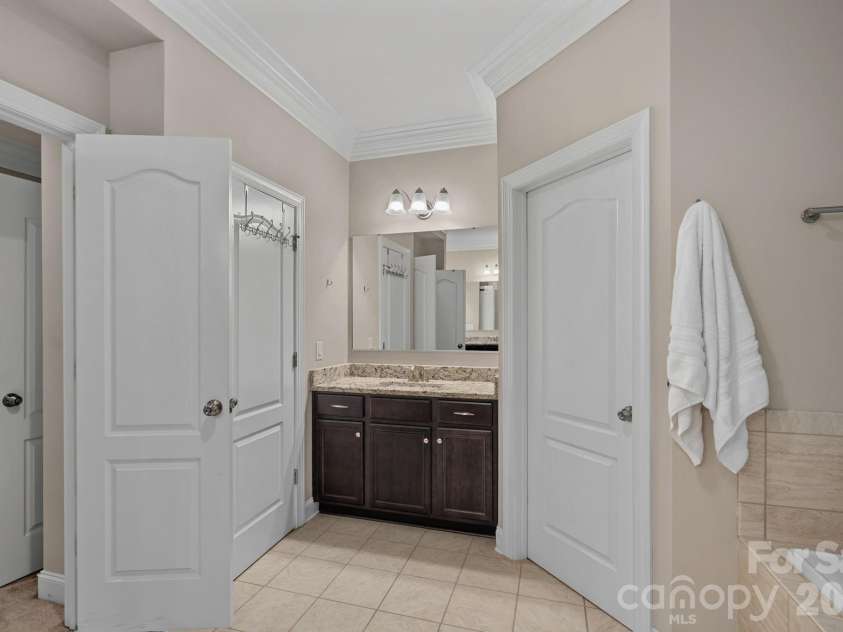 8211 Caesars Head Drive, Waxhaw, NC 28173.  MLS# CAR4408223, YatesRealty ID 44252. Separate vanities in primary bath