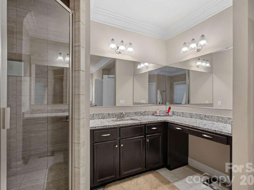 8211 Caesars Head Drive, Waxhaw, NC 28173.  MLS# CAR4408223, YatesRealty ID 44252. Separate vanities in primary bath