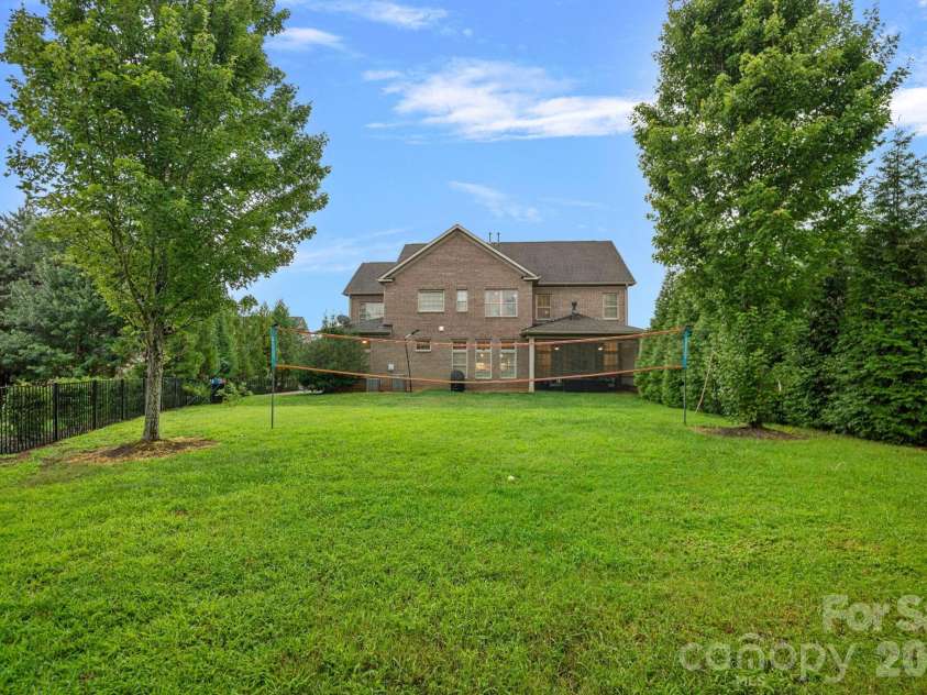 8211 Caesars Head Drive, Waxhaw, NC 28173.  MLS# CAR4408223, YatesRealty ID 44252. Tree lined private fenced backyard, perfect for a pool!