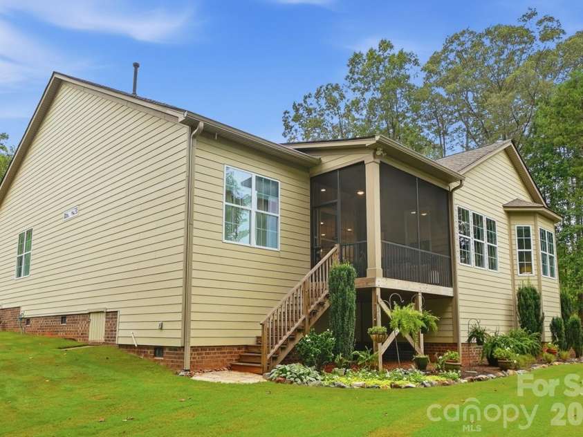 7717 Coalcliff Drive, Huntersville, NC 28078.  MLS# CAR4408239, YatesRealty ID 44254. Back of Home