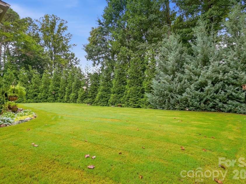 7717 Coalcliff Drive, Huntersville, NC 28078.  MLS# CAR4408239, YatesRealty ID 44254. Backyard