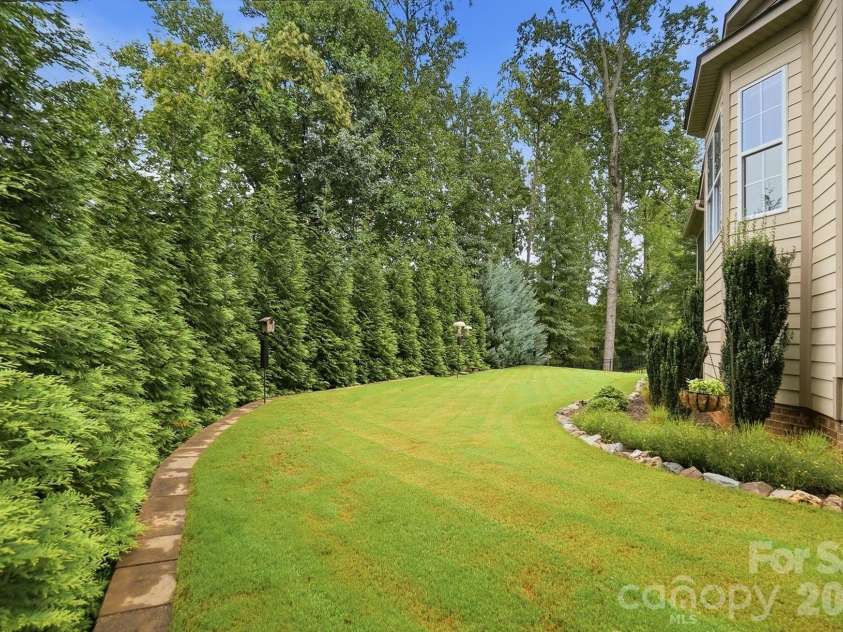 7717 Coalcliff Drive, Huntersville, NC 28078.  MLS# CAR4408239, YatesRealty ID 44254. Backyard